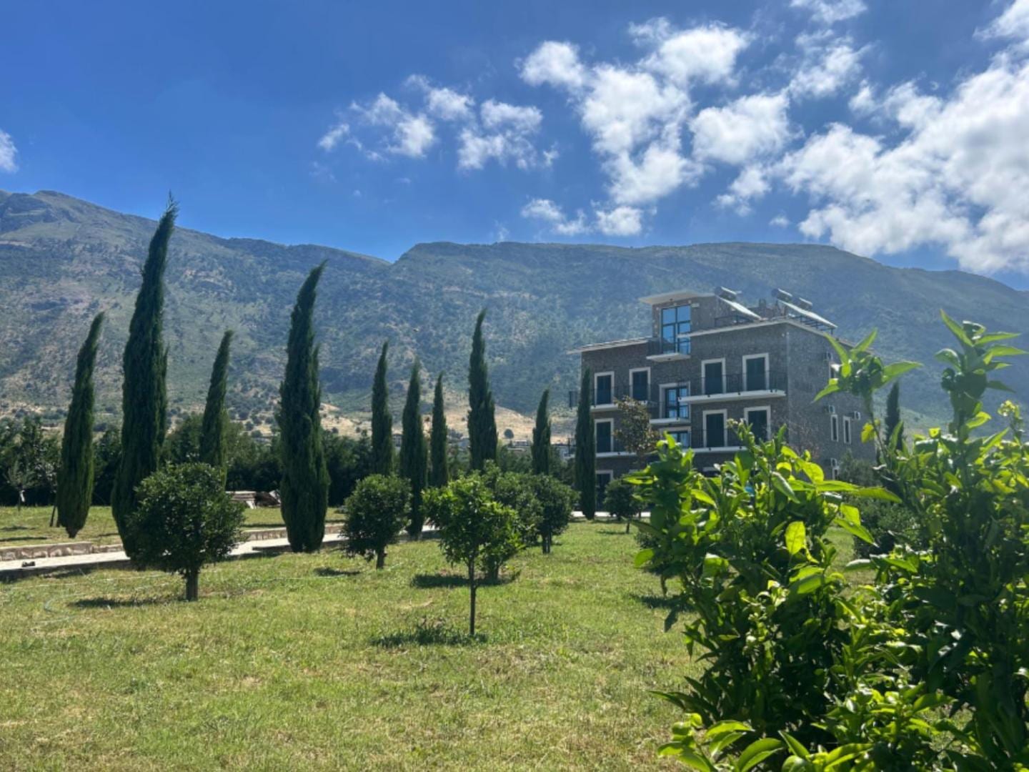 Vila Ami's terrace and garden overlooking the Tragjas valley